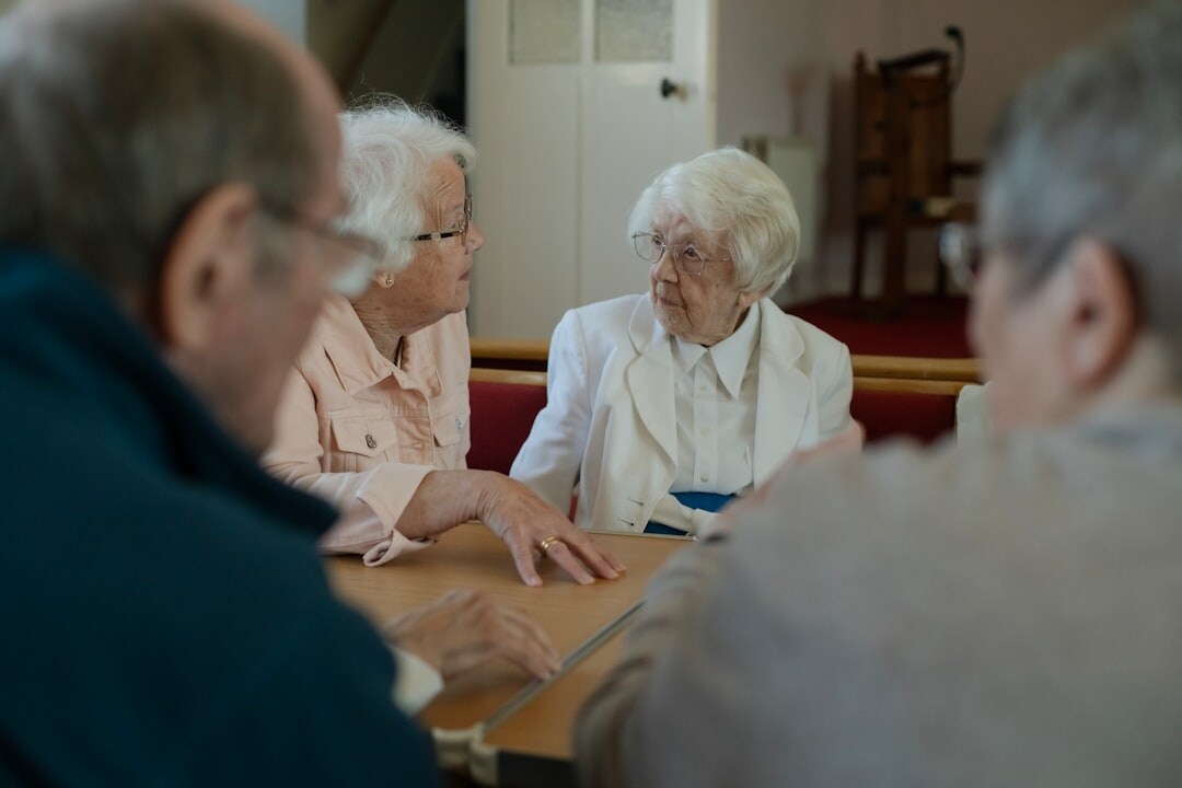 group of seniors playing cards